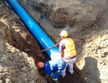 Water main pipe laying